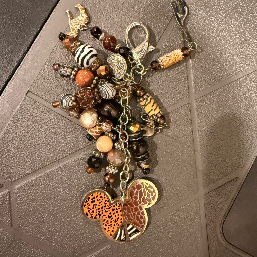 Disney Animal Kingdom Bag Charm with Brown and Gold Accents
